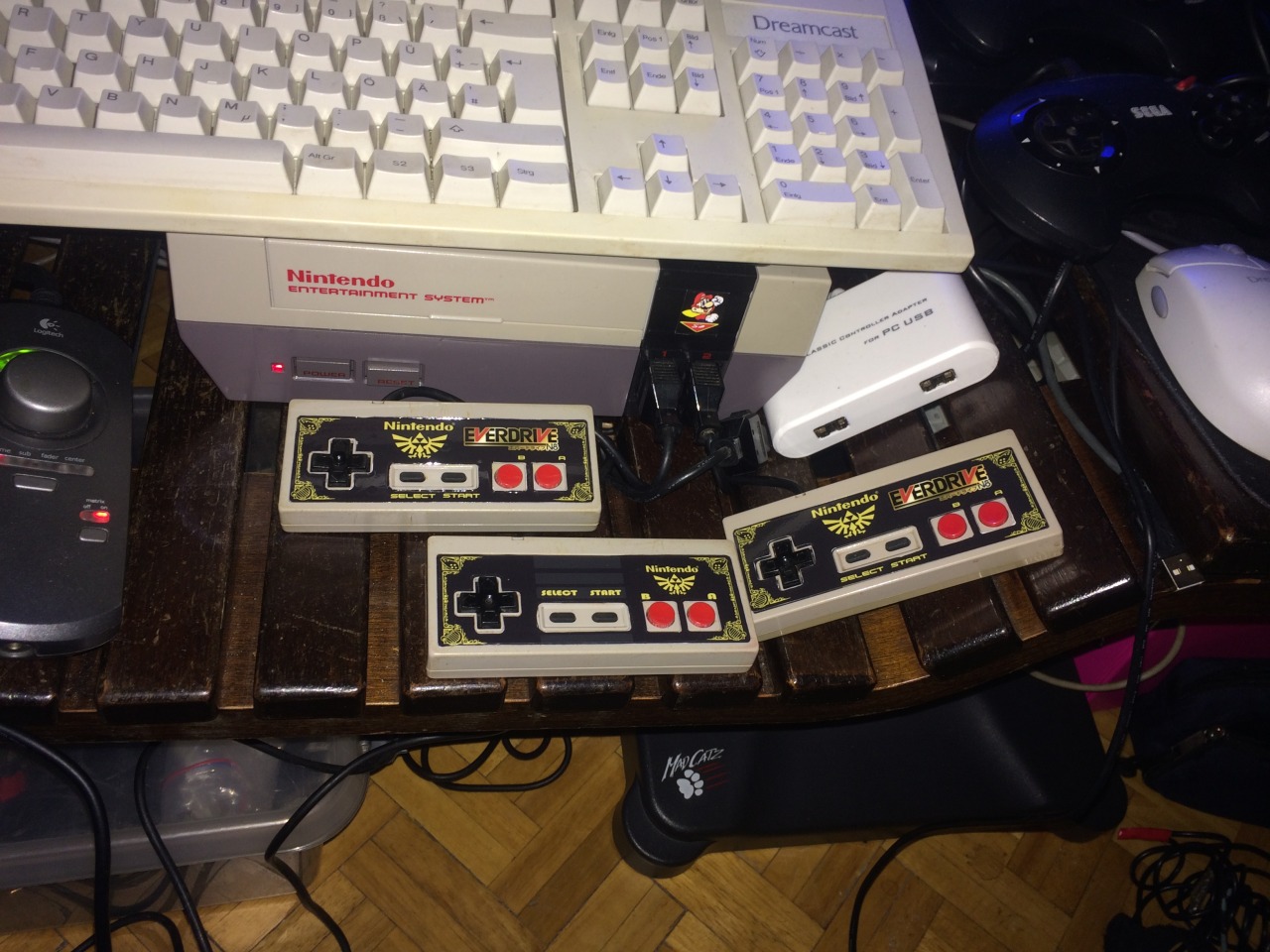 Buy Cheap Nes controllers without stickers, clean them out, and then stick on the new pimp’d stickers :-D