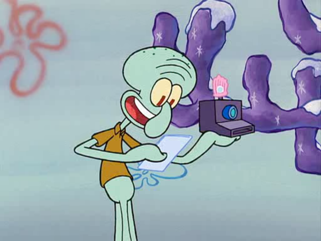 Squidward with a polaroid in Spongebob. 