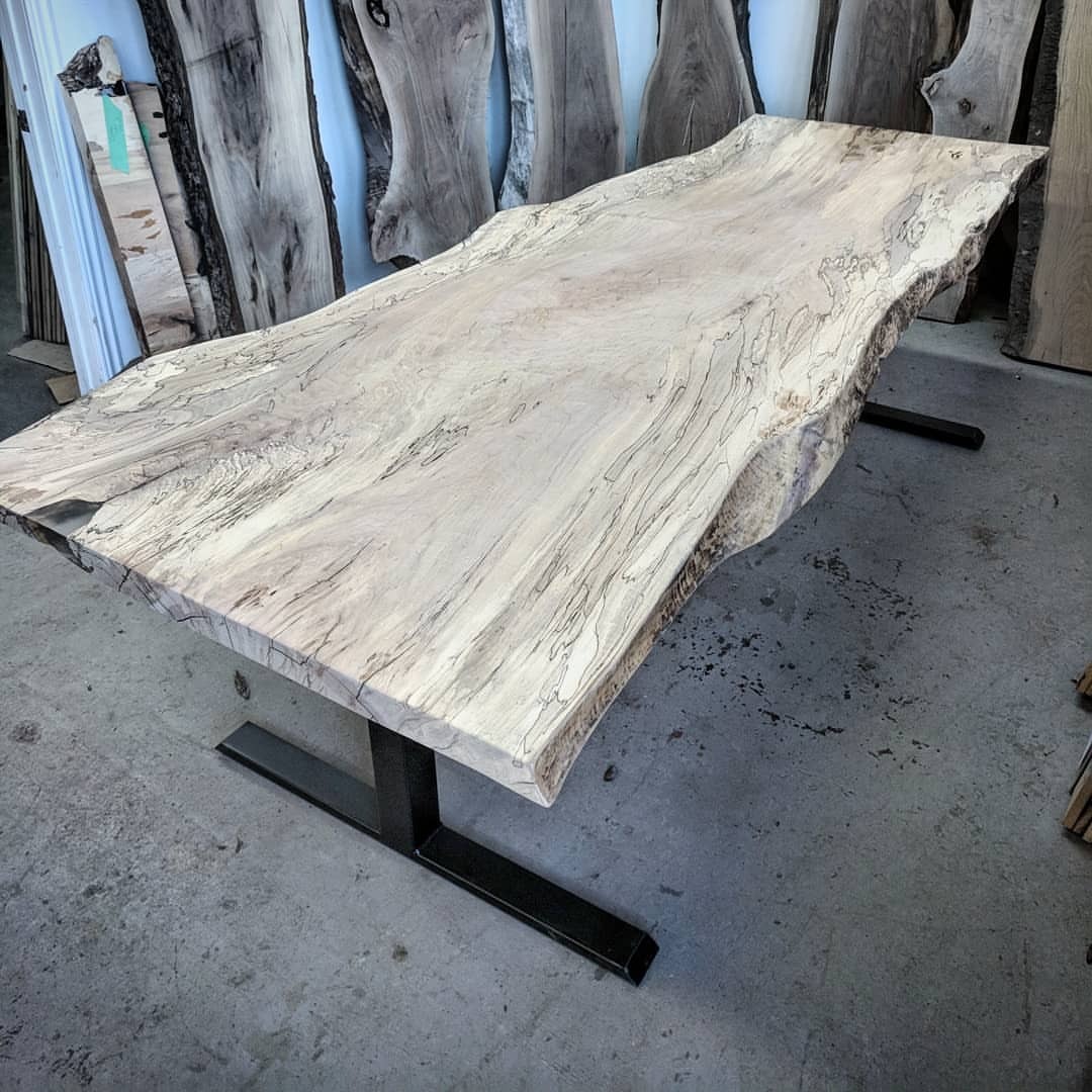 <p>Wild spalted maple one board dining table we recently completed for a client. This was a stunner of a slab that we carefully sanded and clear coated to show off the amazing grain, curves and spalting.</p>
<p>We mounted the table on our pedestal style legs - these are a great design for maximizing the number of seats at a table. (at Barnboardstore.com)<br/>
<a href="https://www.instagram.com/p/BsI3PoAhgIG/?utm_source=ig_tumblr_share&igshid=83c0okuw5ddr">https://www.instagram.com/p/BsI3PoAhgIG/?utm_source=ig_tumblr_share&igshid=83c0okuw5ddr</a></p>