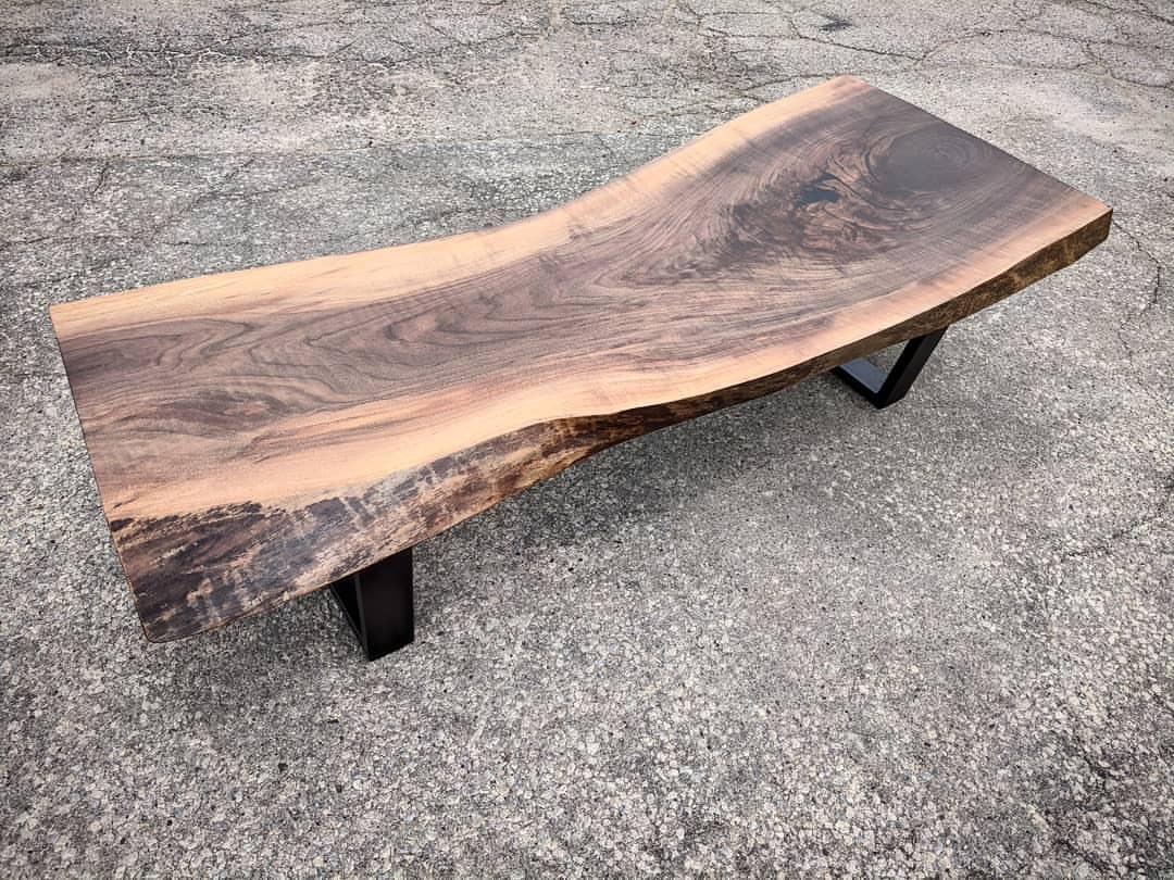 <p>Really nice live edge Ontario Black Walnut coffee table picked up by a nice family at our Toronto shop yesterday. This slab has tons of character and is a sold 2.25 inches thick. </p>
<p>We finished the piece with a satin Osmo Polyx waxoil and mounted it on black trapezoid steel legs. We even had a nice off cut we made into an end table for the client. (at Toronto, Ontario)</p>