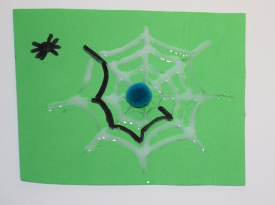 Handcrafted web using glue on paper