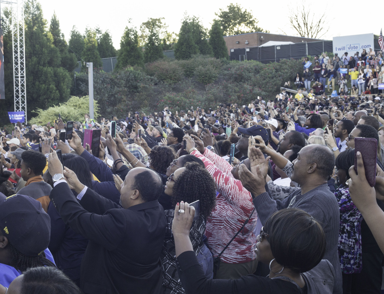 The crowd in Greensboro, North Carolina caught up in the moment with cellphones out as Obama walks out getting ready to speak.