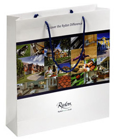 <p>Laminated Paper Bags With Full Color Custom Printing And Rope Handle From Shopping Bags Mart,made of 170g art paper,matt lamination,PP rope handle,euro style with reinforced paper board at top and basement,cmyk full color printing for photographic image on surface of bag.</p><p>Because laminated paper bags have opp file lamination and reinforced paper board,laminated paper bags have durable and sturdy construction for long lasting,With custom printing,laminated paper bags will become colorful,wonderful advertisement to display business information and image everywhere for branding and marketing.As paper bags manufacturer,Shopping Bags Mart specialize in printing and manufacturing laminated paper bags coming in any size and color,Detail please go <a href="http://www.papershoppingbags.cc">http://www.papershoppingbags.cc</a></p>