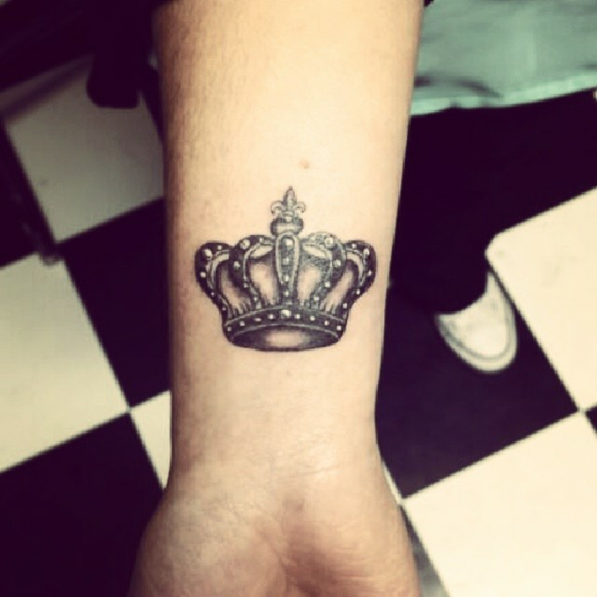 little wrist tattoo of a crown by tattoo artist little wrist tattoo of a crown by tattoo artist