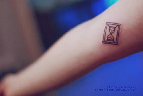 Tattoo tagged with: black, clock, hourglass, inner arm, little, micro,  minimalist, other, seoeon, small, tiny 