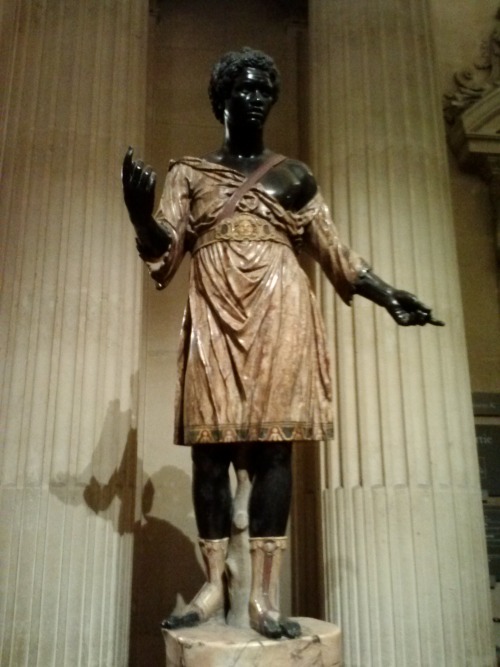 madaraslove submitted to medievalpoc:

I recently went to the Louvre on Sunday and came across this interesting statue. Since they were closing I blitzed past it and was unable to decipher the words on the plaque. Do you happen to know who this is a statue of? Who made it and its historical background?

Readers?