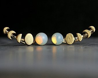 <p>(via <a href="https://www.etsy.com/listing/524077387/waxing-moon-and-genuine-vintage-opal">Waxing Moon and genuine vintage opal stone ear climbers. Tiny | Etsy</a>) </p>