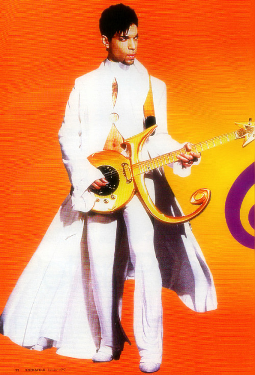 Prince and guitar. From Rock & Folk Magazine, 1997.