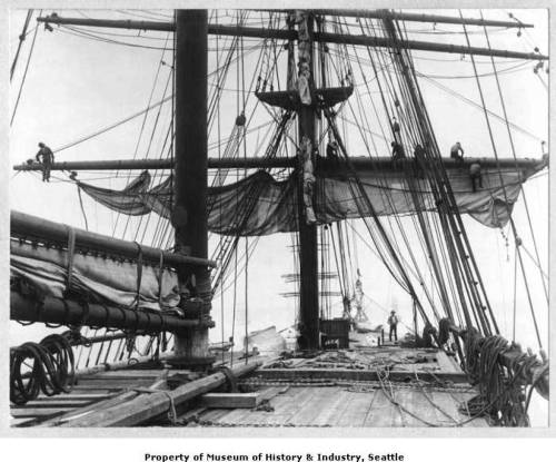 historicwharf:
“ “The nautical term “bending” means tying a rope to another rope or to a spar or post. Bending the foresail, as shown in this photo, means tying the foresail to the yardarm which supports it. From time to time, sails were removed for...