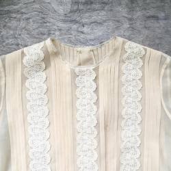 The lace detail and color of this vintage blouse is so lovely…