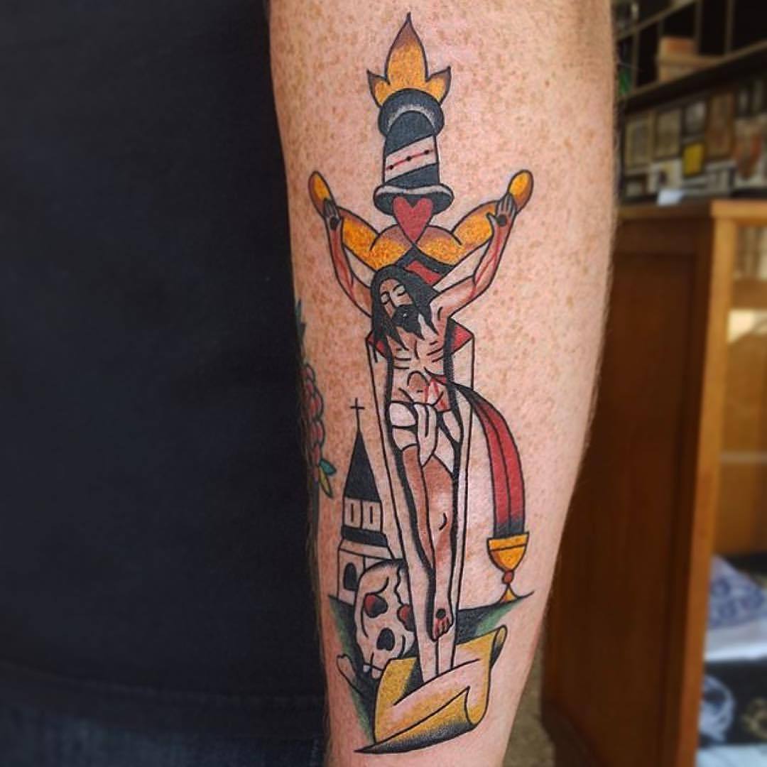 classic traditional dagger tattoo with a religious tattoo classic traditional dagger tattoo with a religious tattoo