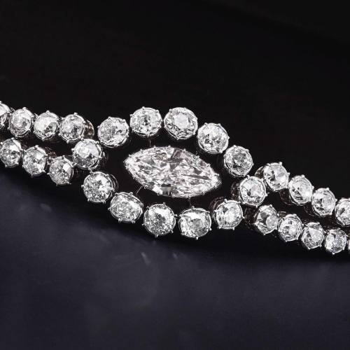 This diamond bracelet, mounted by Cartier, is offered in our...