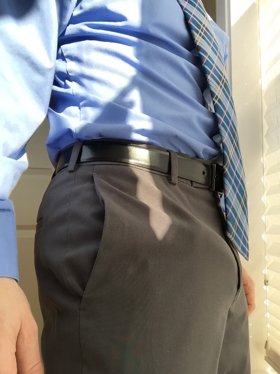 Bulging in work attire.