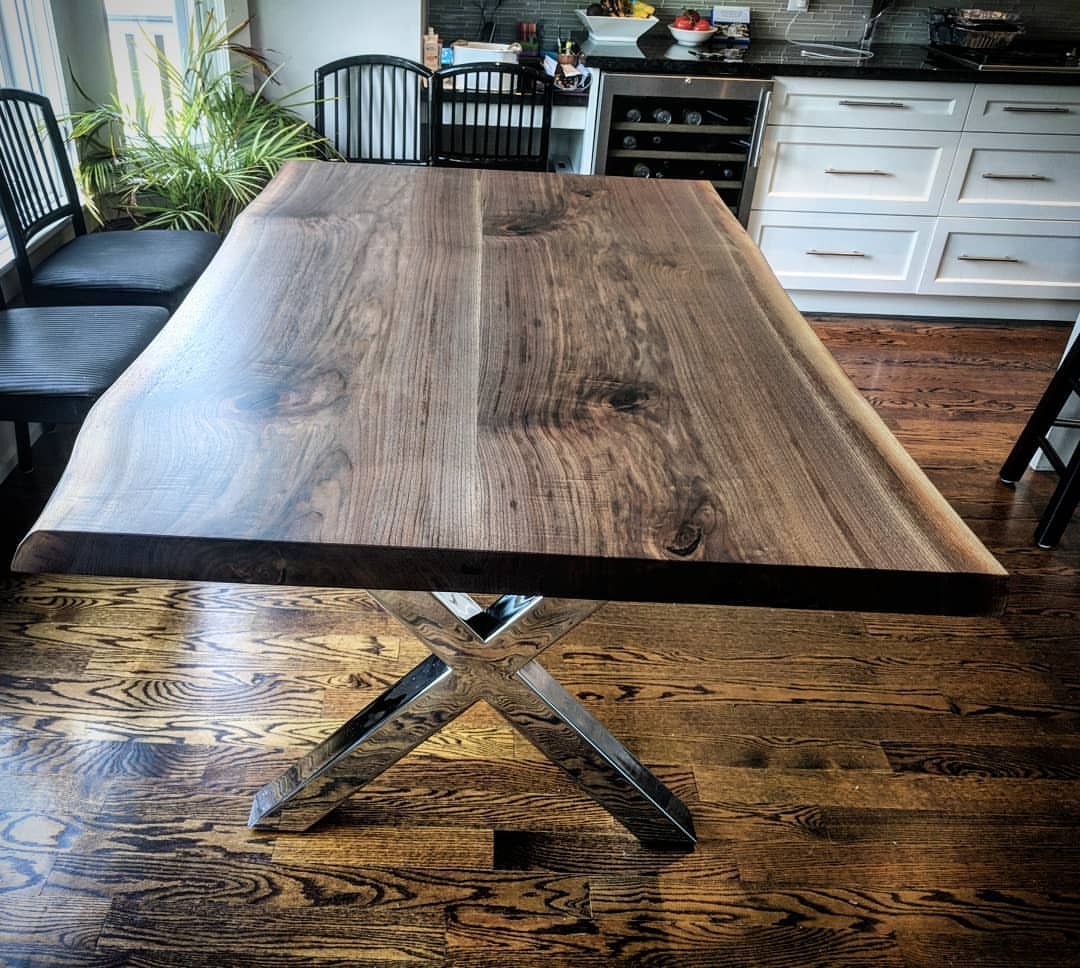 <p>First delivery of the day in the books - a nice two board live edge walnut dining table to a nice couple in East Toronto. We finished the top with a satin Osmo Polyx and mounted it on some classy chrome X legs. (at Barnboardstore.com)</p>