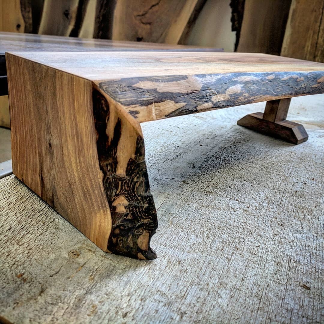 <p>Mini cheeseboard waterfall table. We got a little creative with some off cut pieces of live edge walnut at the shop and made this little gem. It is a tiny replica of a dining table with a waterfall leg on one side and a pedestal leg on the other. </p>
<p>Cute conversation piece for serving your favourite charcuterie board foods. It has a food safe finish.</p>
<p>One only at the Toronto shop - first $50 takes it! Email us at sales@barnboardstore.com (at Barnboardstore.com)<br/>
<a href="https://www.instagram.com/barnboardstore/p/BvorFquhCvN/?utm_source=ig_tumblr_share&igshid=h4frzuqze6h5">https://www.instagram.com/barnboardstore/p/BvorFquhCvN/?utm_source=ig_tumblr_share&igshid=h4frzuqze6h5</a></p>