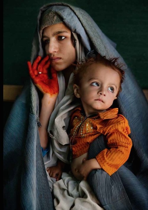 A young mother and her son in Afghanistan, from the...