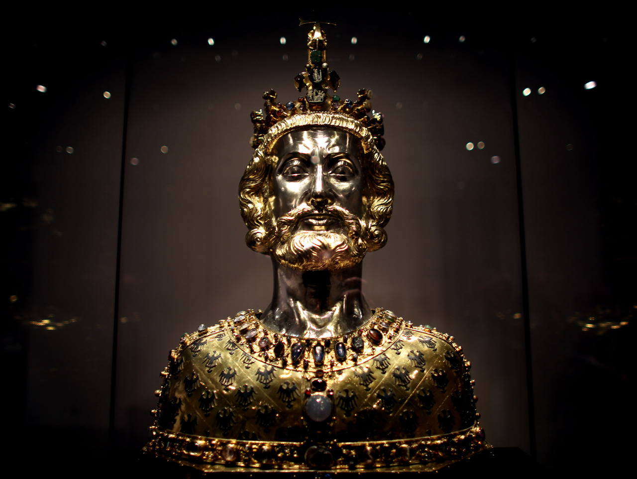 The Bust of Charlemagne is a reliquary in the form of the bust of Charlemagne made around 1350, which contains the king&rsquo;s skullcap. The reliquary is part of the Late Medieval treasure kept in the Aachen Cathedral Treasury. It is one of the most significant examples of Gothic goldwork and the best-known example of a reliquary bust anywhere. The reliquary is an idealised image, not an actual portrait of Charlemagne.(Click on the image. It’s breathtaking.)