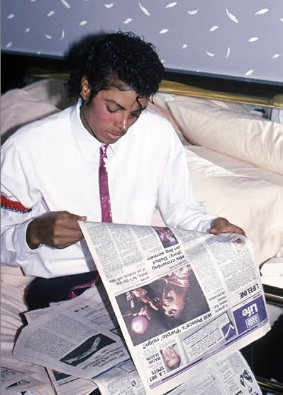 funkygalaxy: “Michael Jackson checking out Prince on the paper. ”