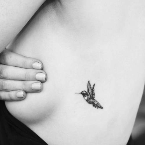 Tattoo tagged with: small, micro, nautical, animal, swallow, rib, tiny, bird,  travel, little, evankim, illustrative 