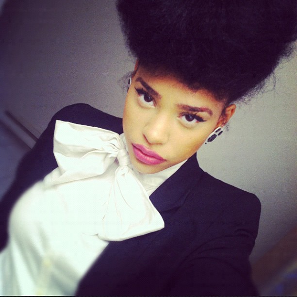 Beautiful black business woman Afro bun