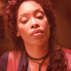 gif of Zoe from Firefly looking away