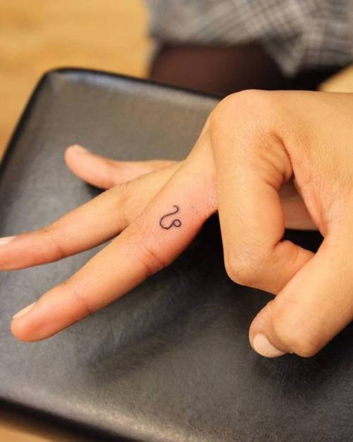 By Wicky Nicky, done at Moon Sheen Tattoo, Manhattan.... small;finger;zodiac symbol;micro;symbols;wickynicky;tiny;leo symbol;ifttt;little;astrology;minimalist