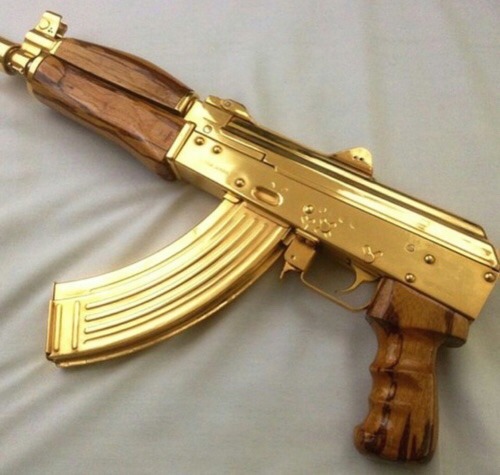 gold gun on Tumblr