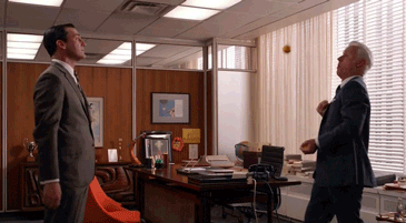Juggling at the office GIF