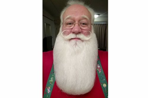 This year, veteran Santa Claus portrayer Eric Schmitt-Matzen was...