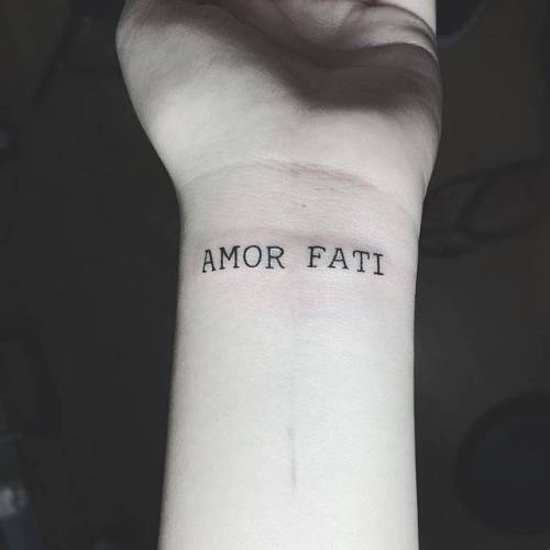 By Jing, done at Jing’s Tattoo, Queens.... jing;small;latin;amor fati;languages;tiny;love quote;love;ifttt;little;typewriter font;wrist;latin tattoo quotes;font;lettering;quotes