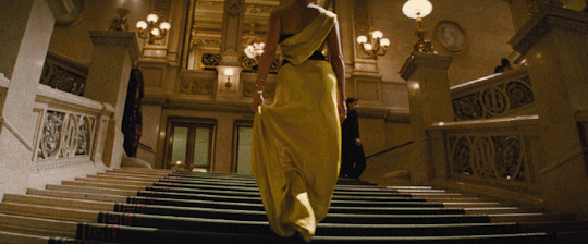 Mission:Impossible - Rogue Nation Rebecca Ferguson in a yellow dress from d...