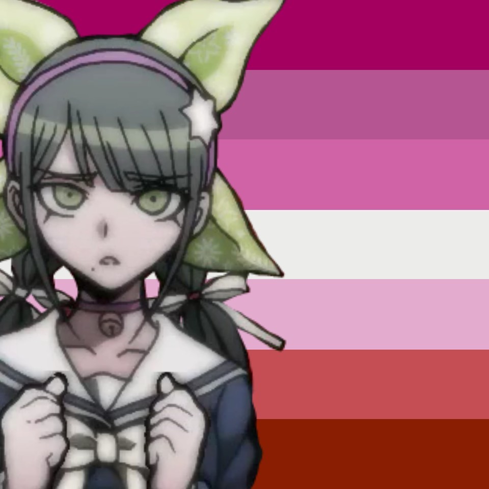 tenko chabashira holds up the gay pride flag