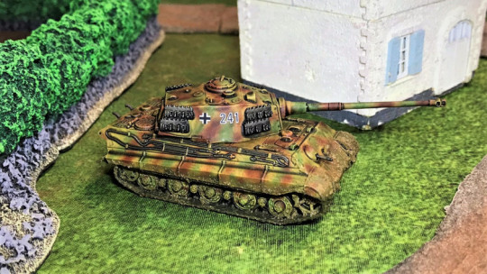 6 Tiger II moving around corner, right side view
