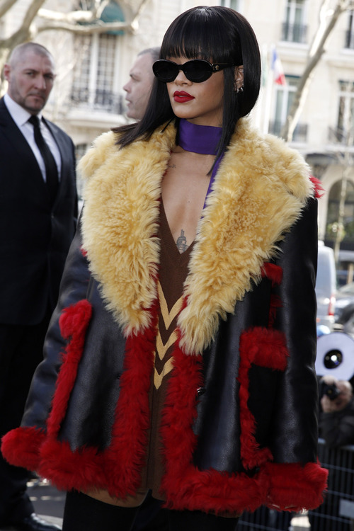 Rihanna attend the Miu Miu fashion show in Paris. - RIHANNANAVYHN
