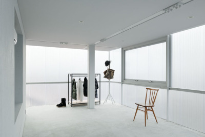 ombuarchitecture:<br /><br />House in Tousuien<br />Hiroshima • Japan<br />By Suppose Design Office<br />The House of Tousuien is located in a quiet residential area, and it is designed for a couple and 3 children. The three sides of this house are surrounded by other residence buildings, and the shape of the site forces the house to stay long and narrow.<br />Most exterior walls are thick and heavy, where windows are added to balance out the heavy look of the exterior. For the House of Tousuien, we used a thin and translucent material to replace the regular exterior walls, where natural light and be maximized in the interior space.<br />via Archdaily<br />