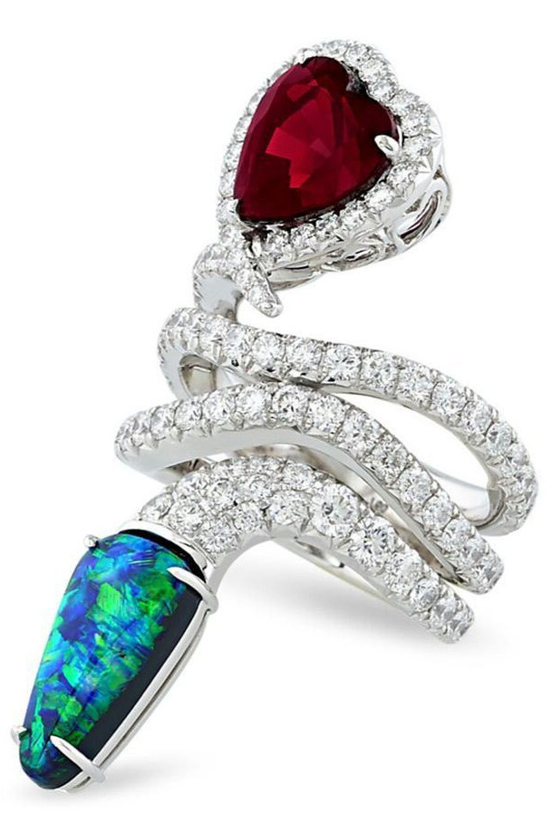 rings for women, beads, fashion, designer, photos This one-of-a-kind serpentine ring is embedded by 3.11 total carats of diamonds. A rare 5.61cts heart-shaped garnet forms the head of the meandering snake. Its tale is set with kaliedoscopic 2.84cts cabochon black opal and set in 18k white gold. From M. S. Ray Antiques. . , cabochon , blackopal , diamond , heartshaped , garnets , garnet , ring , rings , hautejoaillerie , opal , opals , highjewellerydream , gems , jewelryblogger , jewellery , schmuckblogger , instajewels , highjewellery , finejewelry , jewelryaddiction , schmuck , redcarpetjewelry , insta , instadaily , instahappyday , like , want , jewelryart , oneofakind , unusual 