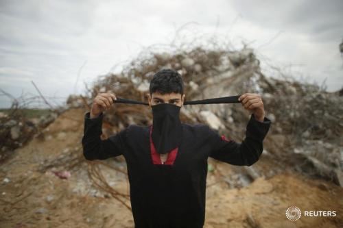 reuterspictures:Gaza’s way of the ninjaYouths, who have...