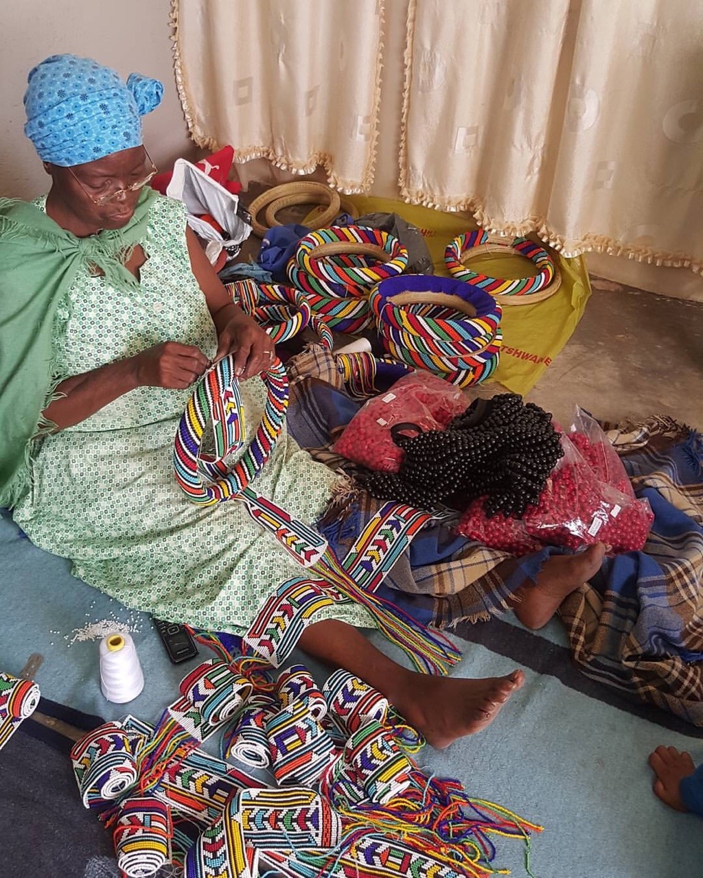 For Africans — A Woman Makes Beaded Necklaces. Kwandebele, South