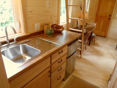 darlingamericancurl:<br /><br />For those in the Pacific North West, this is for you.  The Oregon Cottage Company has designed a jewel.  This 8’ 6” x 20’ is in my top 5 of the tiny house design.  This home has a full size bathtub, a closet for the washer/dryer (the only hidden washer space that I have come across), and a loft that comfortable sleeps four, or sleeps two with space for clothes storage.  This home can be built by the company for a mere $38,000 (the average home price in Oregon is $321,797) or the plans are available for free at the website.  <br />You can find out more information about the home here or you can download the basic plans here.  <br />