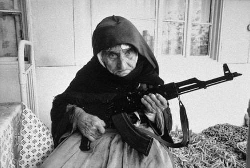 luciferlaughs:A photo of a 106-year-old woman guarding her...