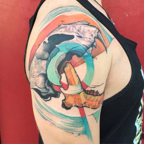 Abstract style right upper arm tattoo. Tattoo artist: Dino Nemec horror;abstract;black;big;tiger skull;graphic;dino nemec;blue;yellow;tatuaje;tatuajes;orange;green;upper arm