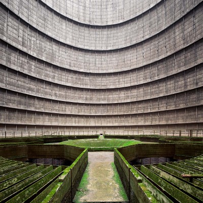 thibaudpoirier:<br /><br />Inside an abandoned cooling tower. This particular one is from the Electrabel power plant, located in Monceau-sur-Sambre, Belgium. Built in 1921, it produced energy from coal and was once responsable for 10% of the entire country’s CO2 emissions. It was shut down in 2007 and is now a symbol of the fading industrial region of Charleroi.Photography by Thibaud Poirier / Behance / Instagram