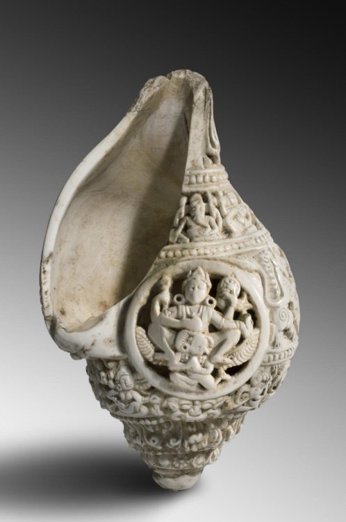 philamuseum: â€œ This shell from the 11th century, which was probably used to hold and pour sacred water during religious ceremonies, depicts the god Vishnu who is known for using a conch shell as a war trumpet. Ritual Water Vessel, c. 11th century or...