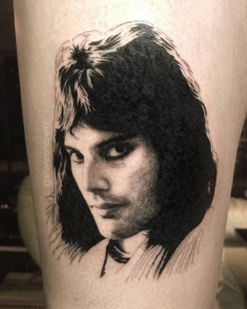 By Shannon Perry, done at Valentine’s Tattoo Co., Seattle.... music;black and grey;patriotic;character;thigh;facebook;twitter;freddie mercury;portrait;shannonperry;medium size;england