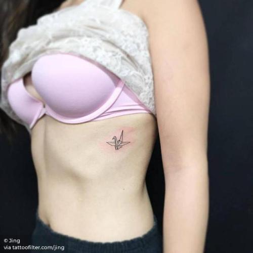 By Jing, done at Jing’s Tattoo, Queens.... jing;origami crane;small;patriotic;line art;japanese culture;rib;tiny;ifttt;little;game;origami;fine line