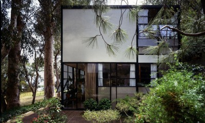 archatlas:<br /><br />Eames House Charles and Ray Eames<br /><br /><br /><br /><br />The Eames House, Case Study House #8, was one of roughly two dozen homes built as part of The Case Study House Program. Begun in the mid-1940s and continuing through the early 1960s, the program was spearheaded by John Entenza, the publisher of Arts and Architecture magazine.In a challenge to the architectural community, the magazine announced that it would be the client for a series of homes designed to express man’s life in the modern world. These homes were to be built and furnished using materials and techniques derived from the experiences of the Second World War. Each home would be for a real or hypothetical client taking into consideration their particular housing needs.<br />The first plan of the Eameses’ home, known as the Bridge House, was designed in 1945 by Charles Eames and Eero Saarinen. The design used pre-fabricated materials ordered from catalogues, a continuation of the idea of mass-production. Charles and Ray moved into the House on Christmas Eve, 1949, and lived there for the rest of their lives.  The interior, its objects and its collections remain very much the way they were in Charles and Ray’s lifetimes.  The house they created offered them a space where work, play, life, and nature co-existed. <br />Images via + via + via<br />