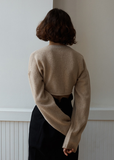 lagarconne-blog:
“ Stockinette-stitched —
Our favorite Cardigan from Lemaire, Oatmeal-tone Shetland-style wool, this button-front cardigan is cropped at the ribs and can be worn in reverse. Round neckline with Drop shoulders. Exaggerated blouson...
