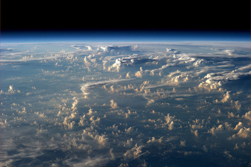 sixpenceee:Clouds cast thousand-mile shadows into space when...