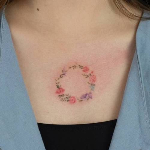 By Comotattoo, done in Seoul. http://ttoo.co/p/35545 flower;small;chest;tiny;flower wreath;como;ifttt;little;nature;illustrative