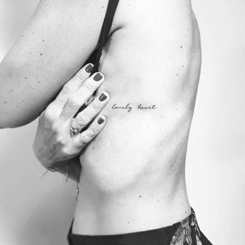 By Christopher Vasquez, done at West 4 Tattoo, Manhattan.... vasquez;side boob;small;line art;languages;rib;tiny;ifttt;little;english;lonely heart;minimalist;quotes;english tattoo quotes;fine line
